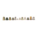 Twelve thimbles for children and dolls, various materials mostly 19th Century (12)