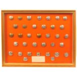 Buttons - police and corporations - three framed displays comprising a framed display of 50 black