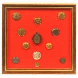 Buttons - Prisons, Schools, Asylums - a framed display of 11 buttons and a badge, including Royal