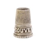 A French heavy gauge silver 'Souvenir' thimble with panel stamped 'C' over a fancy rim