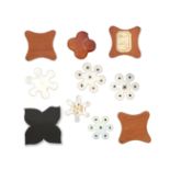 Ten various silk winders comprising an agate example, 3cm, five mother of pearl snowflakes, a set of