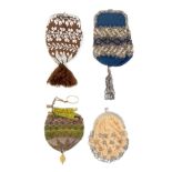 Four 19th Century small format purses part decorated in beadwork, three with steel clasps, one of