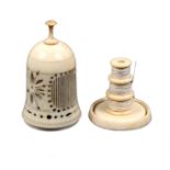 A French ivory reel and thimble case, circa 1820, of bell shape, pierced geometric decoration,