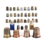 A collection of 36 thimblesª_ including a boxed Dreema, a similar Stratnoid, together with Dorcas,