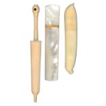 Three needle cases comprising a Palais Royal style mother of pearl example of curved rectangular