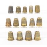 A collection of fourteen mostly 19th Century brass thimbles with inscribed friezes Mizpah x 2/