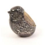 A silver chick pin cushion hallmarked but indistinct, 3.5cm