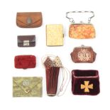 Nine various purses including a leather draw string concertina example, 13cm, three leather