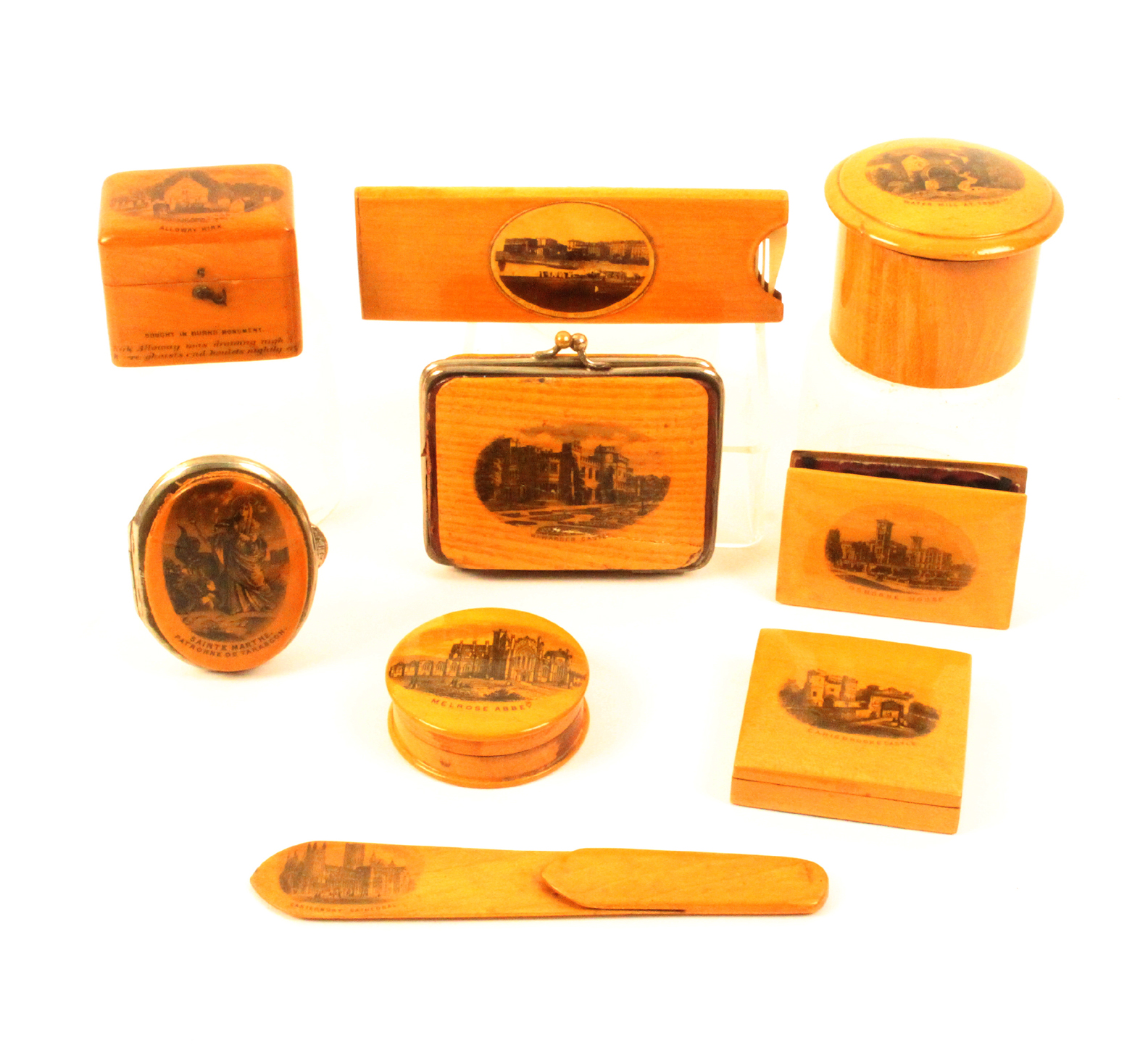 Mauchline ware - nine pieces comprising a rectangular purse (Hawarden Castle - Made From Tree Felled