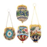 Four small format 19th Century beadwork purses all with decorative gilt clasps, two decorated with