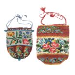 Two 19th Century beadwork draw string bags, one decorated with a band of flowers within maroon