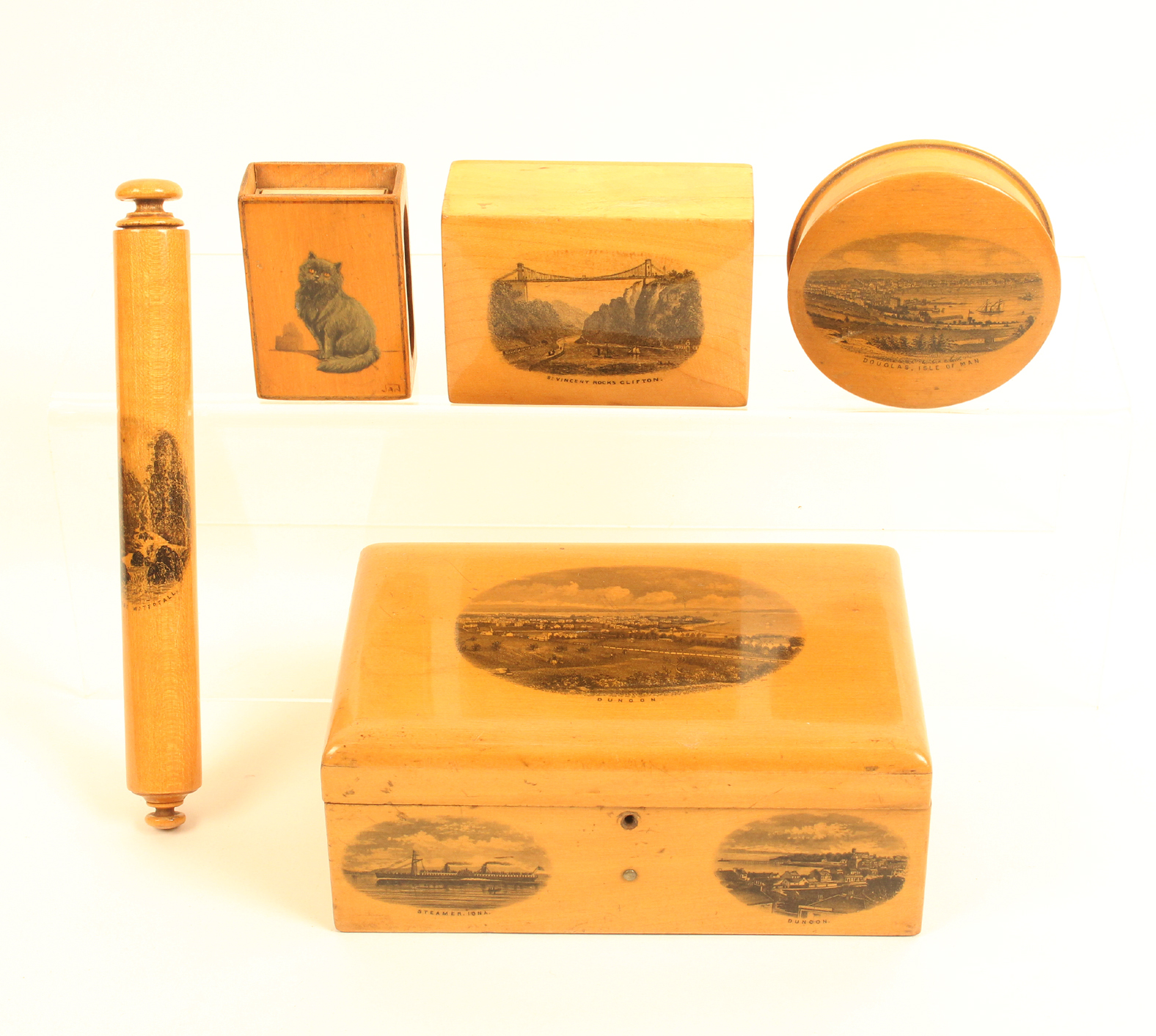 Mauchline ware - five pieces comprising a rectangular box (Dunoon/Steamer Iona/Dunoon) lacking