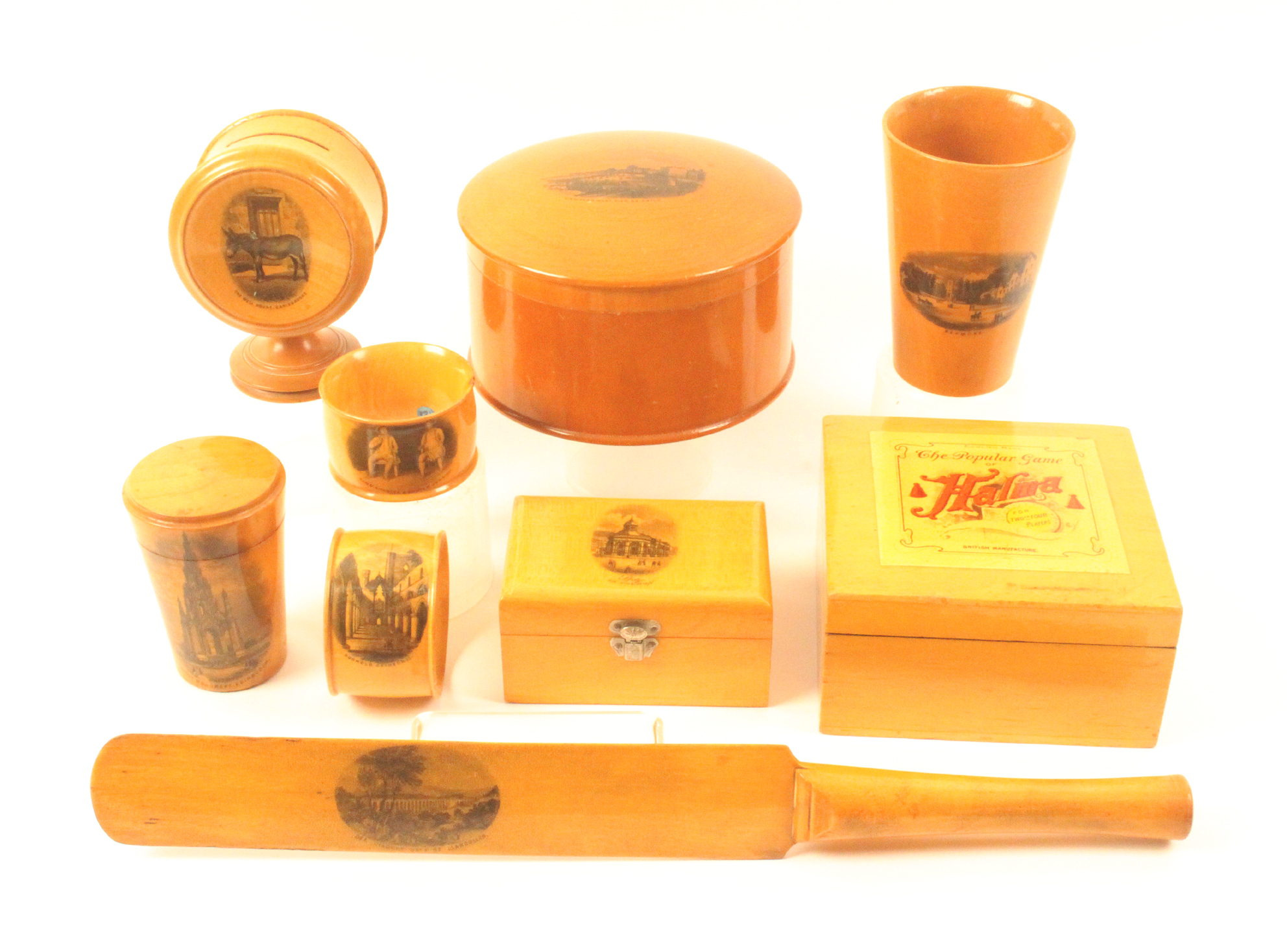 Mauchline ware - nine pieces comprising a large dome top powder box (View From West Pier, Brighton),