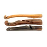 Three wooden knitting sticks, Durham, various woods, two with scroll ends, largest 20cm (3)