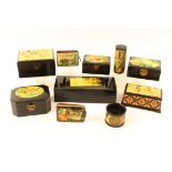 Mauchline ware - ten pieces all black ground comprising a canted rectangular box (Oban/Flowers),