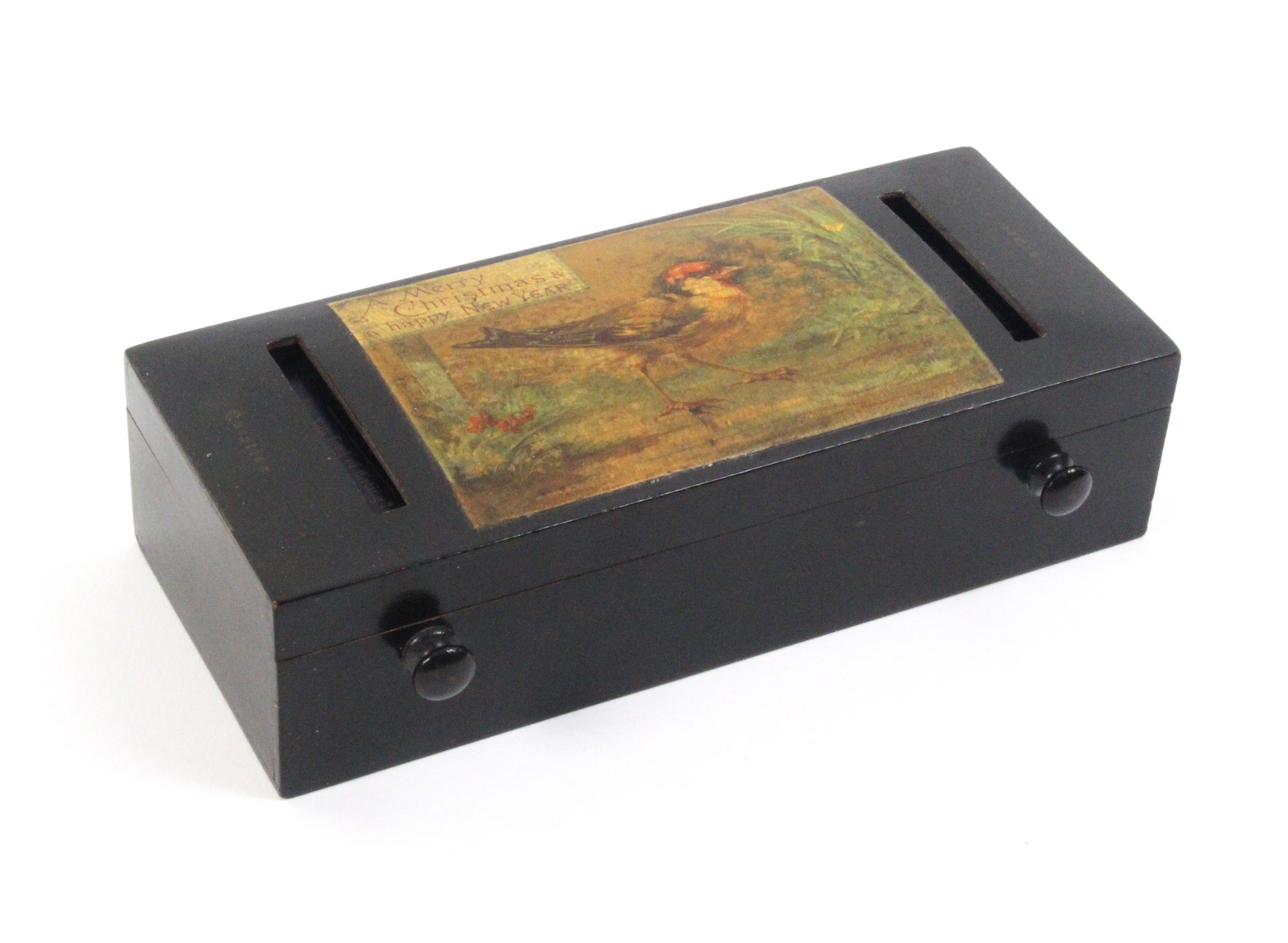 A Mauchline ware fortune telling reel box of rectangular form, black ground (bird amid foliage/A - Image 2 of 2
