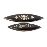 Two horn tatting shuttles each inlaid to one side with flowers and leaves in abalone white metal and