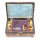 A good tortoiseshell sewing box of rectangular form, circa 1820, the slightly curved sides below