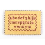 A good sampler style pin cushion/card one side with a lower case alphabet within a zig zag border