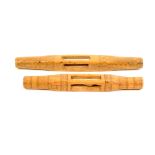 Two French fruitwood knitting sticks of small size each with scratch carved decoration, one with