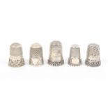 Five English silver thimbles, four hallmarked, all with attractive borders (5)