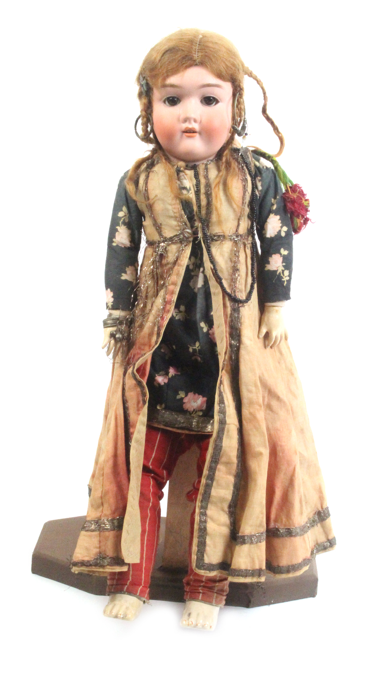 A Handwerck porcelain headed doll, open mouth marked 'Made In Germany/H/0_', composition body, 50cm