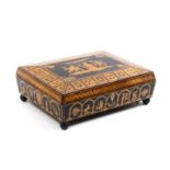 A Regency penwork card box of sarcophagal form the sides with pillars and arches filled with