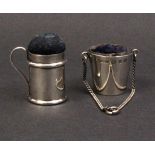 A silver pin cushion and a thimble bucket, the pin cushion as a muffinier, Birmingham, 1902 by Henry