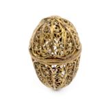 A late 18th Century silver gilt filigree egg form thimble case, hinged cover, 3.5cm