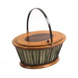 A Georgian satinwood horn and mahogany inlaid oval sewing basket, horn or quill side pins backed