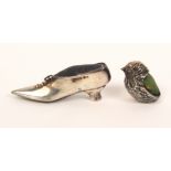 Two silver pin cushions comprising a chick, import marks, 2.5cm, and a lady's shoe with wire lace,