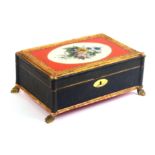 A continental sewing box, circa 1820, of rectangular form, the sides in printed paper with column