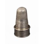 A rare Georgian combination silver thimble, the circular base fitted as a vinaigrette with gilded