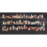 Fifty vintage ceramic Christmas cake decorations, largest, 9cm, (50)