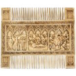A carved and stained ivory double comb in the 14th century Gothic style, French 19th century or