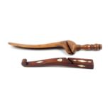 Two wooden knitting sheaths, comprising a scroll end mahogany example inlaid with bone diamonds