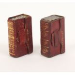 Two red leather book form needle packet boxes both with gilt tooled spines and titled 'Needles', one
