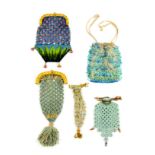 Five 19th Century small format purses comprising two knotted examples one in floral trellis, a net