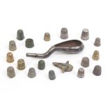 A collection of medieval and later brass, bronze and steel thimbles including two palm examples (