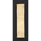 A fine 19th Century carved ivory needle case of rectangular section one side carved with a young