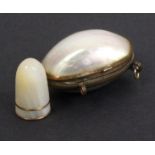 A mother of pearl Palais Royal style thimble with double gilt frieze, contained in a mother of pearl