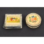 Two bone painted pin cushions comprising a disc form example one side brightly painted with flowers,