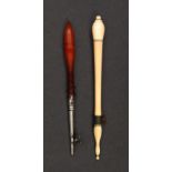 Two tambour hooks comprising an agate handled example with engraved silver stem and butterfly screw,