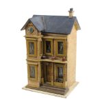 An Edwardian dolls house and contents, the paper covered wooden house with pillared overhang to