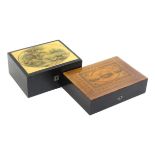 Two Mauchline ware sewing boxes the first of rectangular form, ebonised sides, lid with fancy
