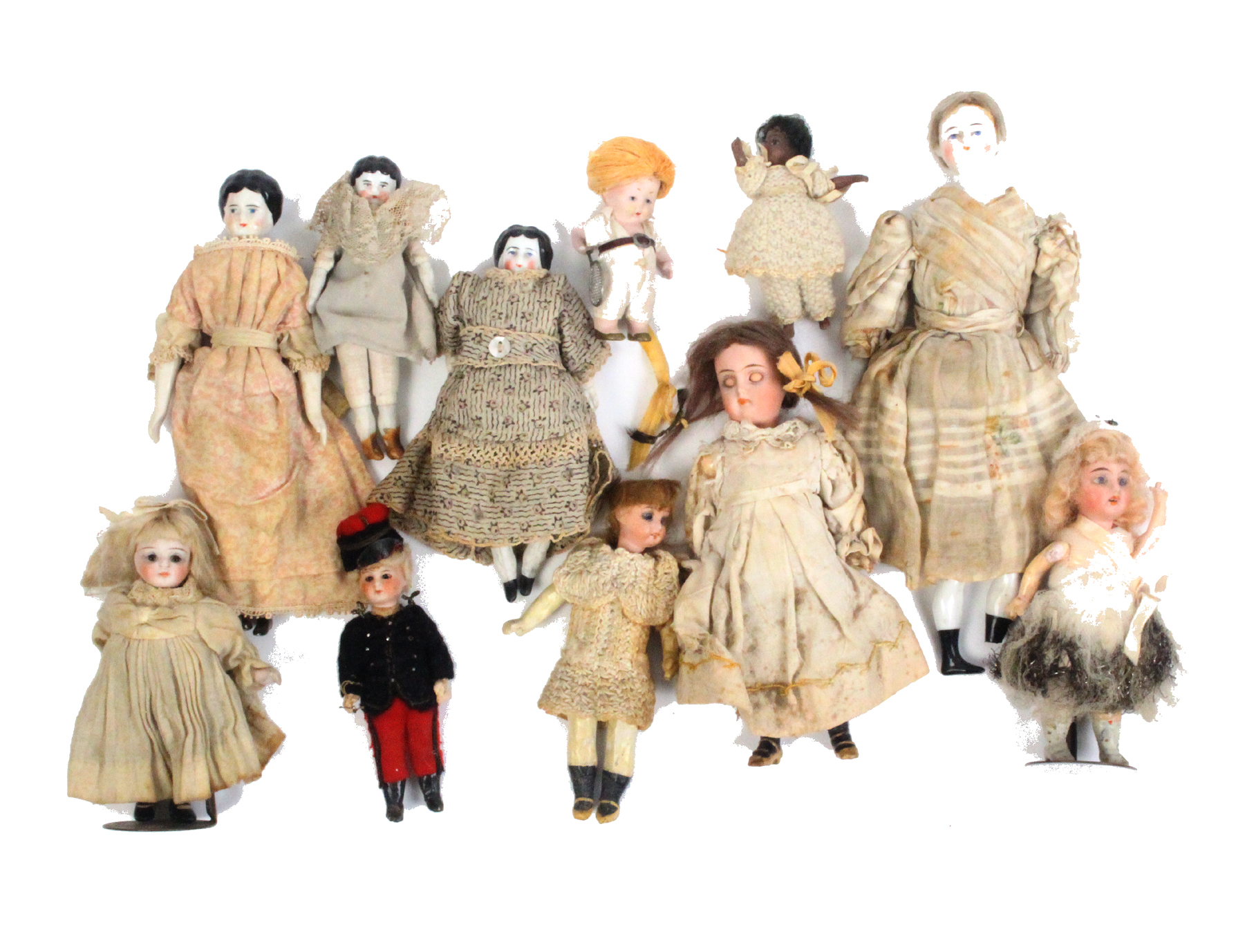 Eleven Victorian and later small format dolls all with ceramic heads, largest 19cm (11)