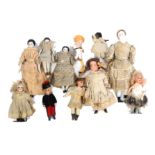 Eleven Victorian and later small format dolls all with ceramic heads, largest 19cm (11)