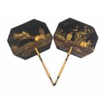 A pair of Regency face screens of octagonal form decorated in chinoiserie style lacquer with