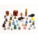 Thimbles and thimble cases comprising a velour book form thimble case with thimble 'Silver Cased
