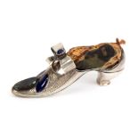 A silver and embellished pin cushion in the form of a lady's shoe the point with oval agate and